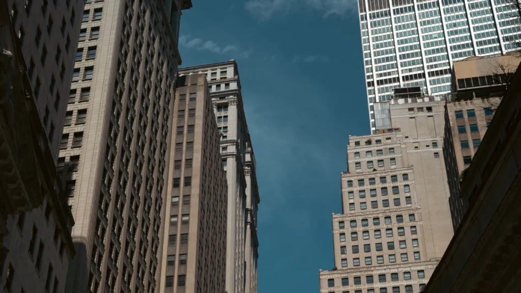 Skyscrapers in New York's Financial District viewed from street level.
