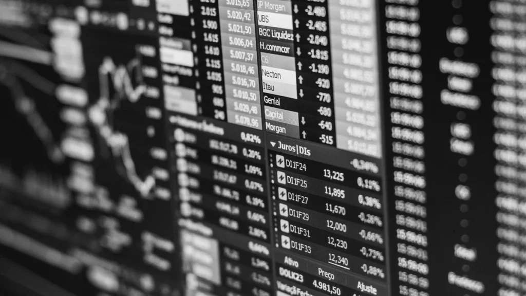 Black-and-white stock market data displayed on a financial trading screen.