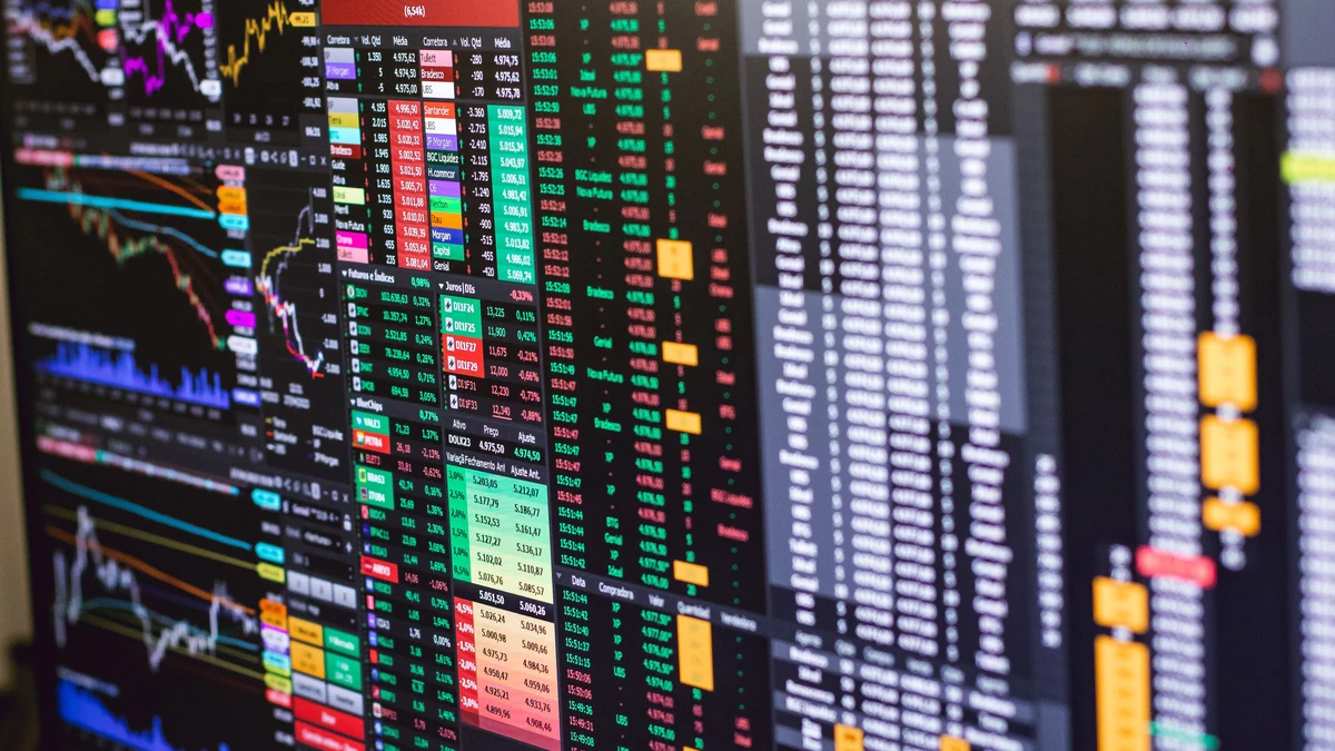 Close-up of financial trading screens displaying price charts and market data.