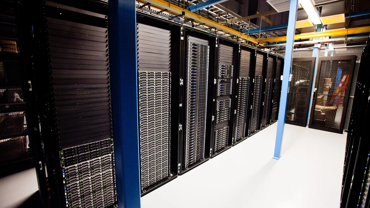 Rows of server racks inside a Wikimedia data center.