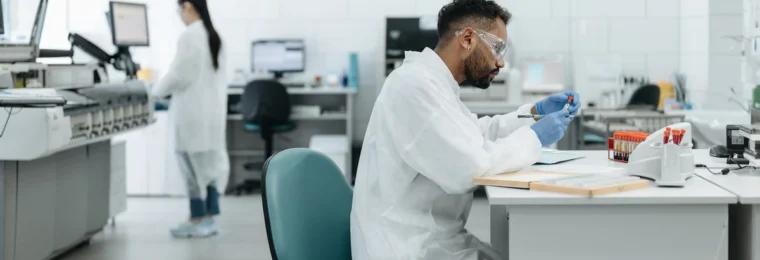 Researchers analyzing samples in a modern medical laboratory.