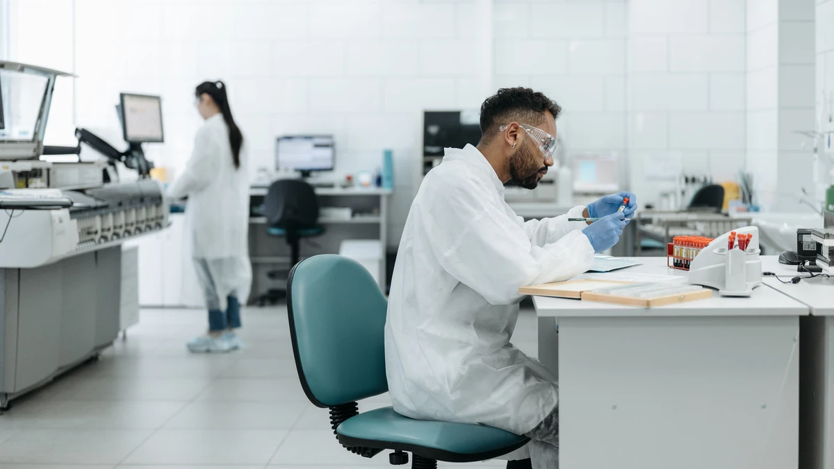 Researchers analyzing samples in a modern medical laboratory.