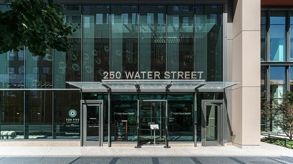 Entrance to Bristol Myers Squibb offices at 250 Water Street in Cambridge, Massachusetts.