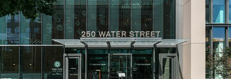 Entrance to Bristol Myers Squibb offices at 250 Water Street in Cambridge, Massachusetts.