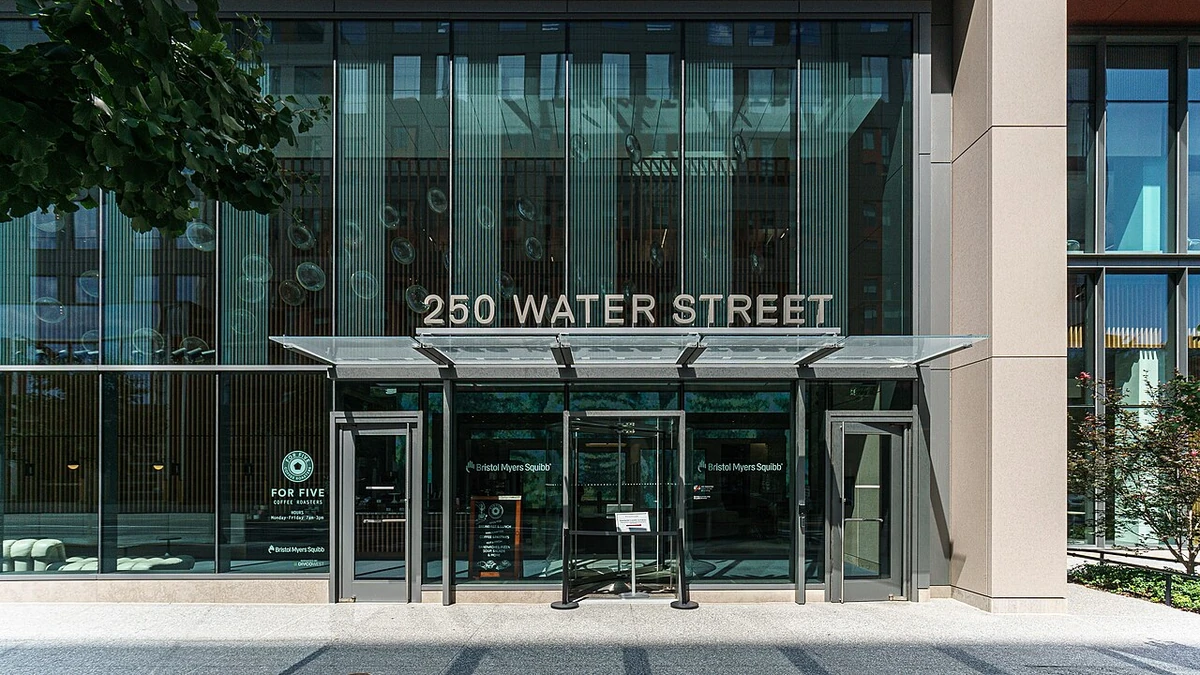 Entrance to Bristol Myers Squibb offices at 250 Water Street in Cambridge, Massachusetts.