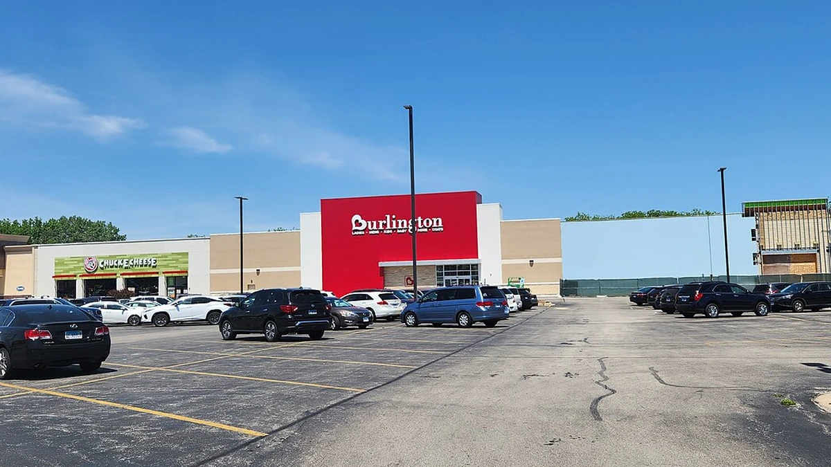 A Burlington store in Villa Park, Illinois, with a red Burlington storefront sign and a parking lot in front.
