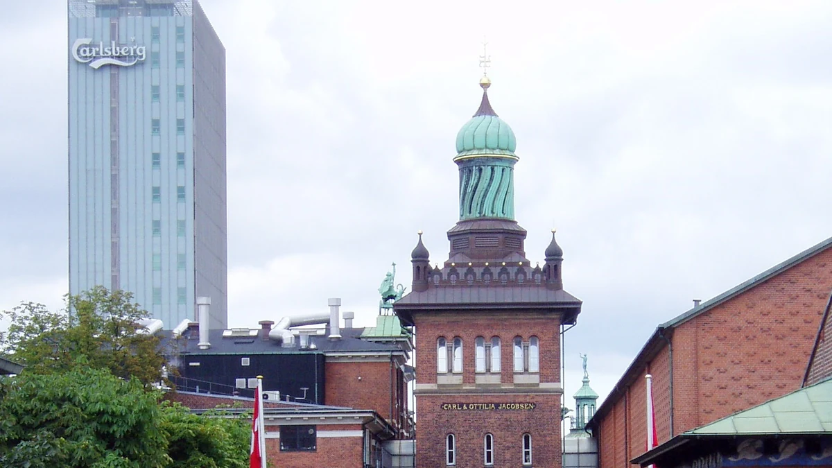 Historic Carlsberg brewery buildings and the Elephant Gate tower in Copenhagen.