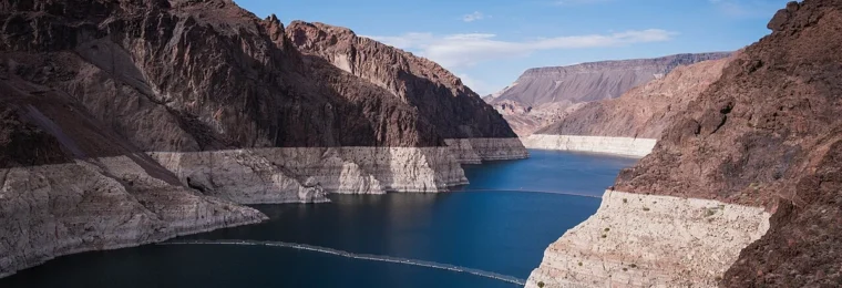 Lake Mead in Black Canyon with a white bathtub ring marking lower water levels near Hoover Dam.