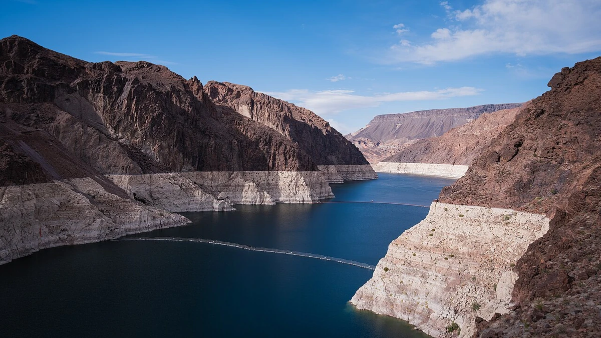 Lake Mead in Black Canyon with a white bathtub ring marking lower water levels near Hoover Dam.