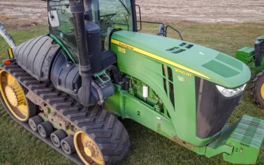 John Deere tracked tractor in a field in Wisconsin.