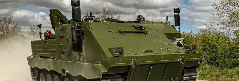 FFG ACSV G5 tracked armored vehicle driving on a dirt road.