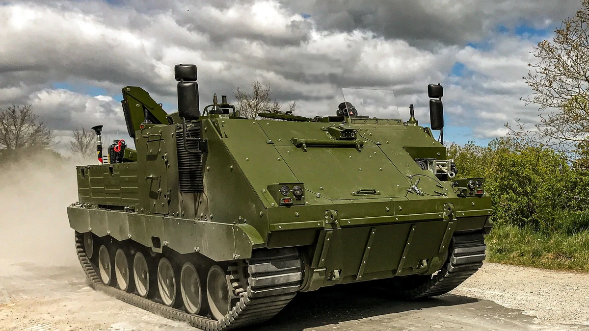 FFG ACSV G5 tracked armored vehicle driving on a dirt road.