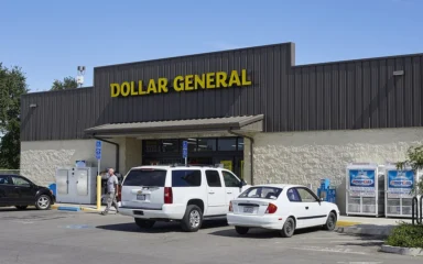 A Dollar General store in Durham, California, with the yellow storefront sign clearly visible above the entrance.