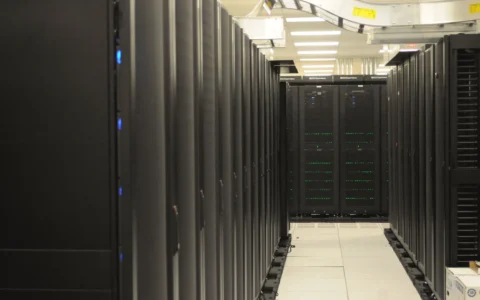 Rows of server racks inside the National Energy Research Scientific Computing Center.