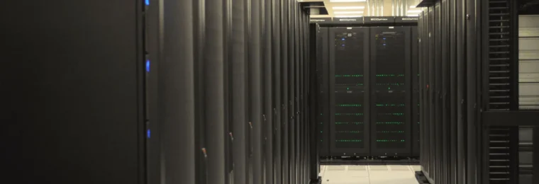 Rows of server racks inside the National Energy Research Scientific Computing Center.