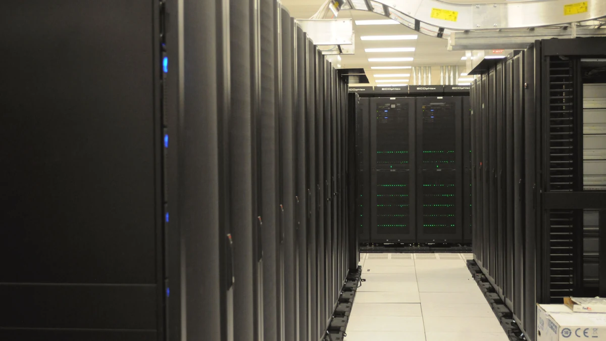 Rows of server racks inside the National Energy Research Scientific Computing Center.
