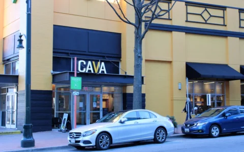 Exterior of a CAVA restaurant in downtown Silver Spring, Maryland.