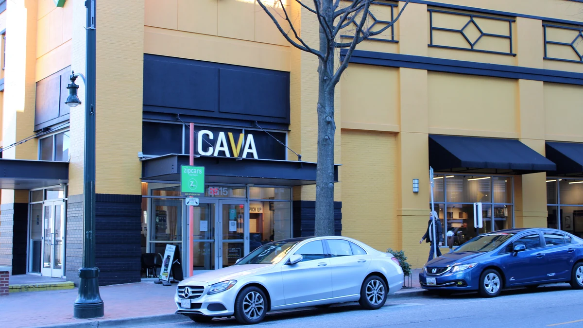 Exterior of a CAVA restaurant in downtown Silver Spring, Maryland.