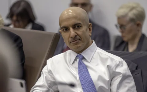 Neel Kashkari seated during a Federal Open Market Committee meeting in Washington.