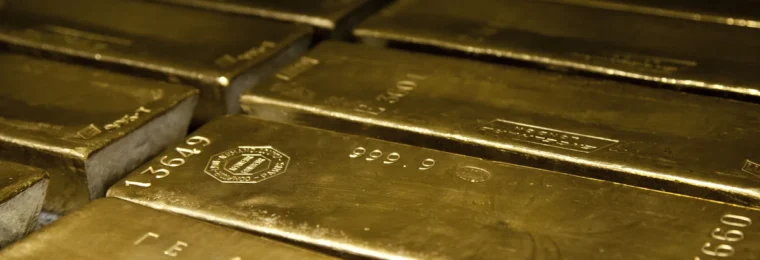 Close-up of four-nines fine 400-ounce gold bars.
