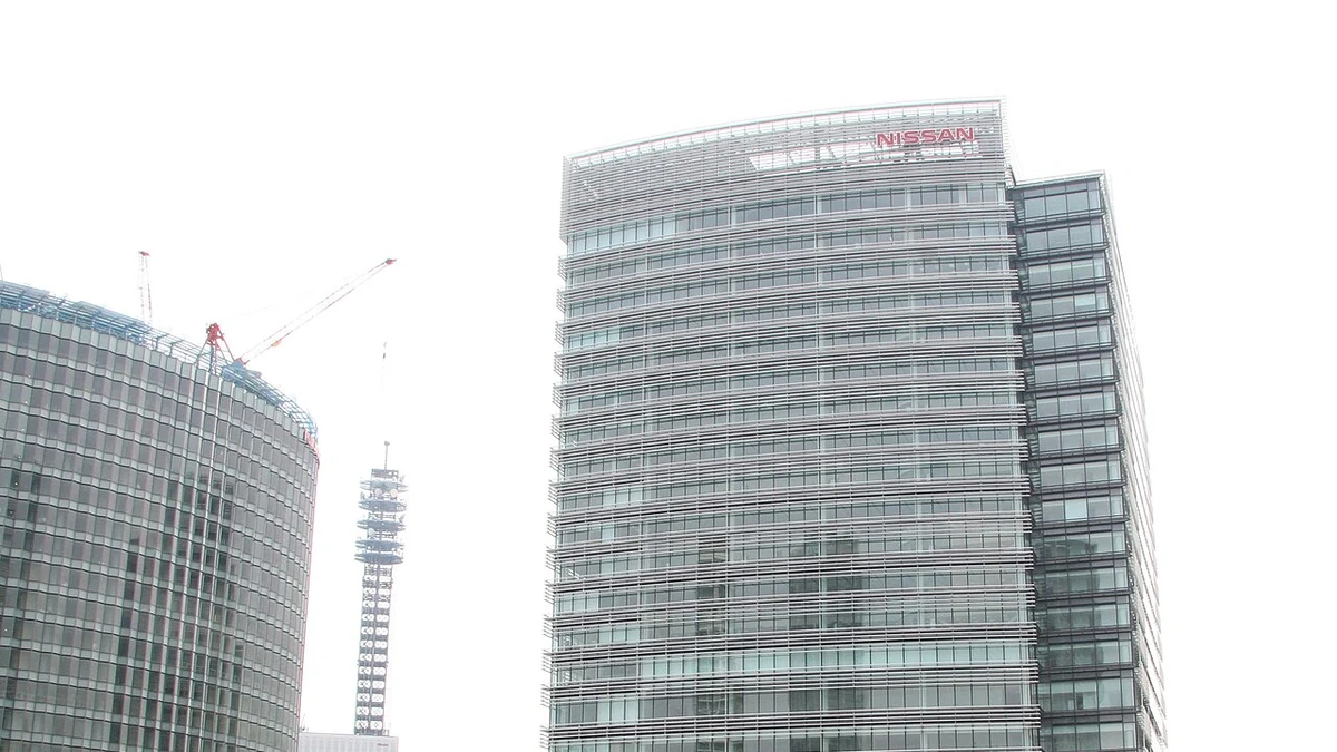 Nissan Global Headquarters building in Yokohama, Japan, with the Nissan sign visible near the top.