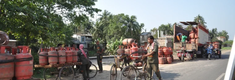 LPG cylinders being distributed along Kalyani Expressway in West Bengal, India.