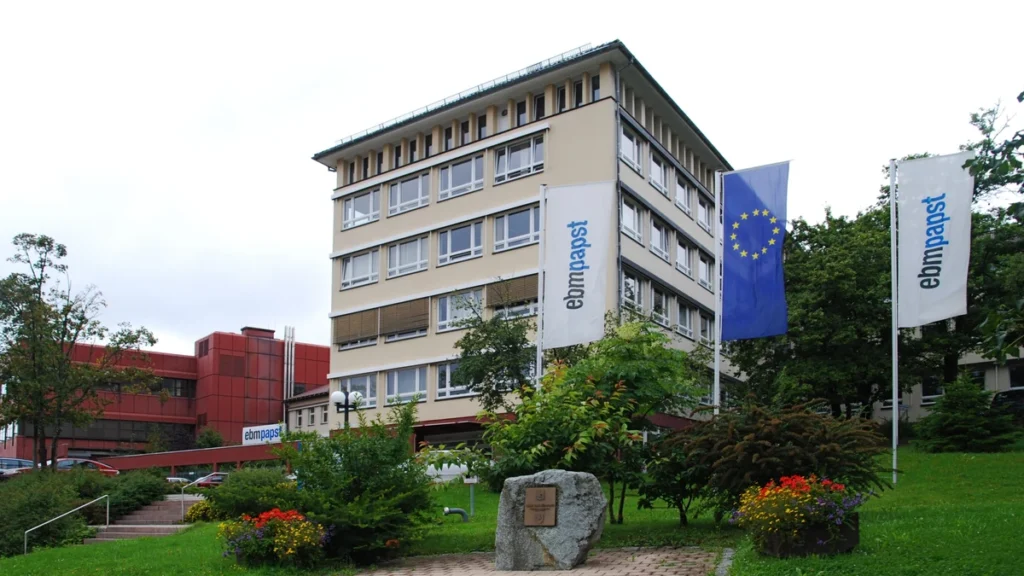 ebm-papst facility with company flags in St. Georgen im Schwarzwald, Germany.