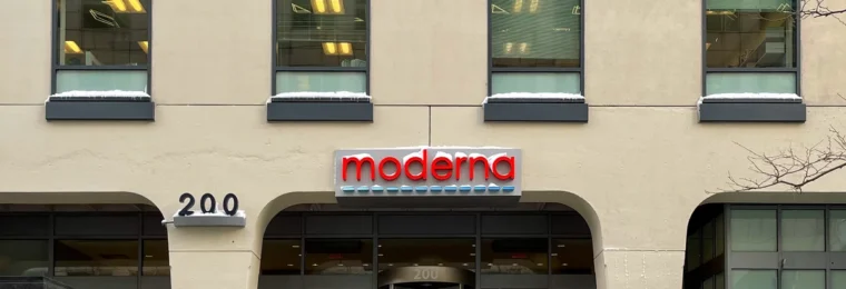 Moderna office building entrance in Cambridge, Massachusetts, with the Moderna sign above the doors.