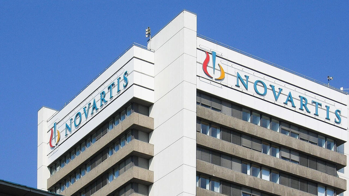Novartis headquarters building in Basel, Switzerland, with Novartis signage.