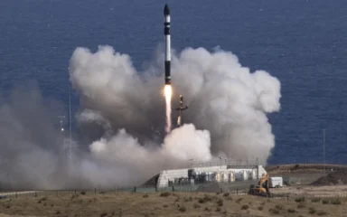 A Rocket Lab Electron rocket lifting off from Launch Complex 1 in New Zealand.