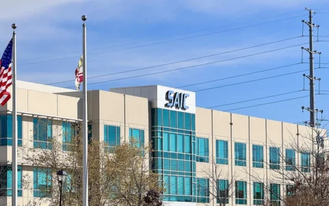 SAIC office building in California, Maryland, with the SAIC sign visible on the facade.
