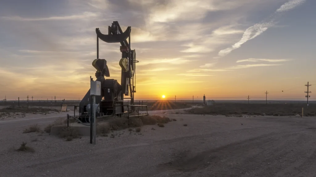 Oil well at sunrise on the outskirts of Eunice, New Mexico, in Lea County.