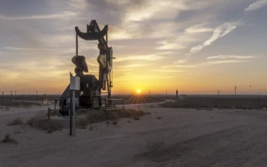 Oil well at sunrise on the outskirts of Eunice, New Mexico, in Lea County.