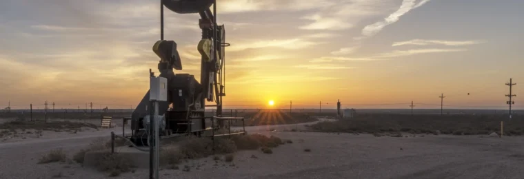 Oil well at sunrise on the outskirts of Eunice, New Mexico, in Lea County.