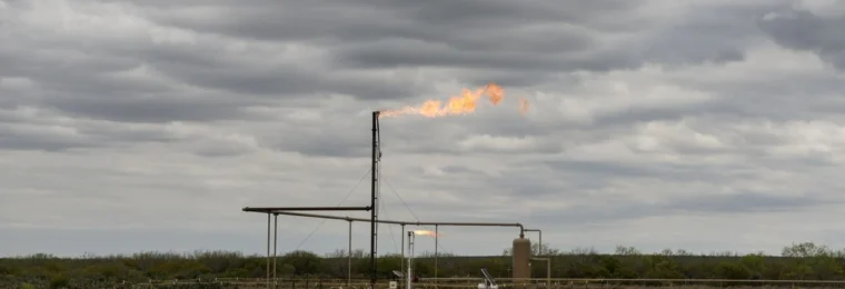 Natural-gas facility with a flare stack near Carrizo Springs in Dimmit County, Texas.