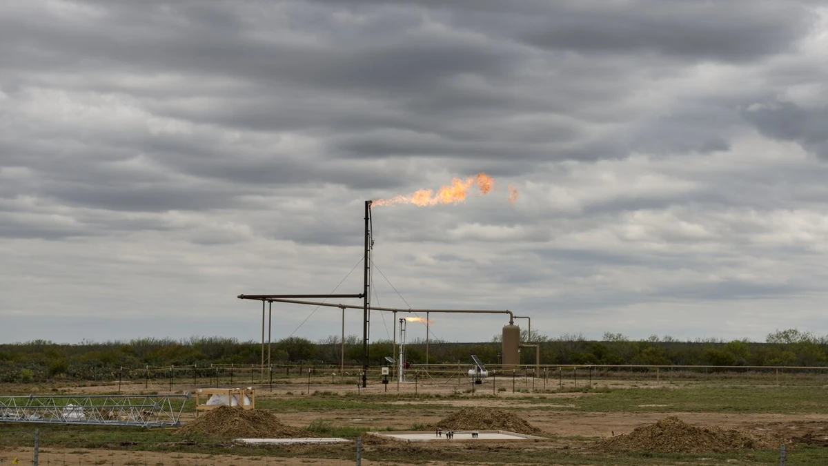 Natural-gas facility with a flare stack near Carrizo Springs in Dimmit County, Texas.