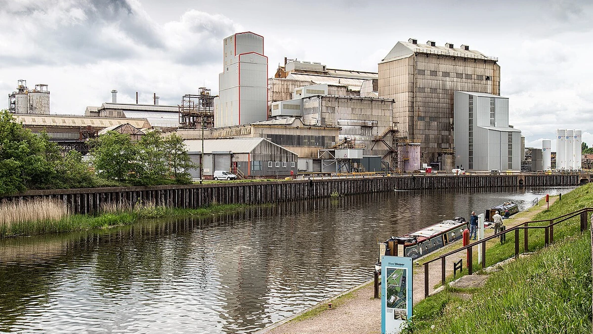 Industrial buildings at the Tata Chemicals Winnington plant beside a waterway in Northwich, England.