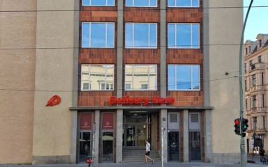 Delivery Hero office building with company signage in Berlin.
