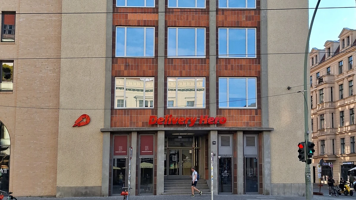 Delivery Hero office building with company signage in Berlin.