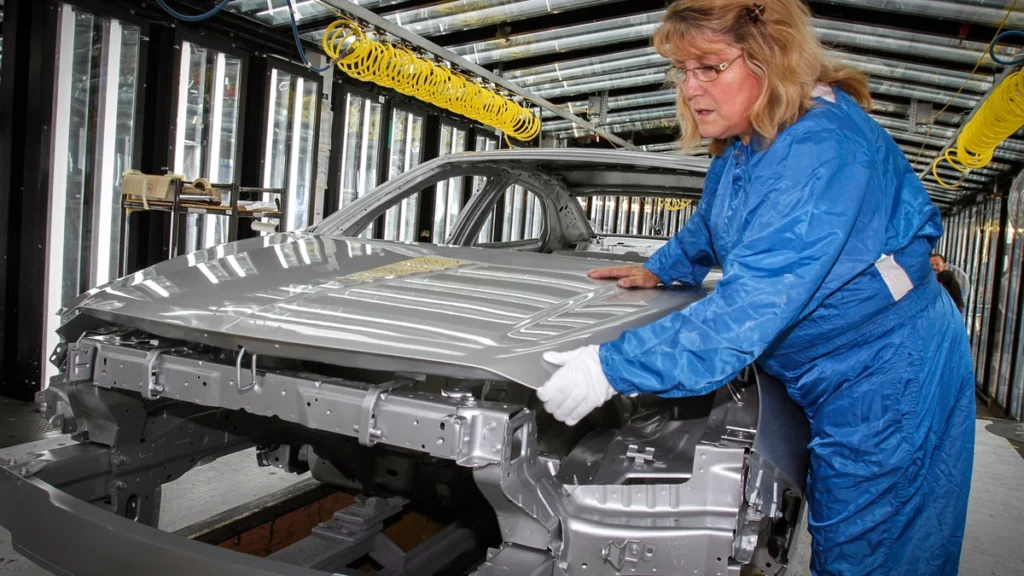A worker on an automobile production line at the General Motors Fairfax Assembly Plant in Kansas City, Kansas.