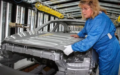 A worker on an automobile production line at the General Motors Fairfax Assembly Plant in Kansas City, Kansas.