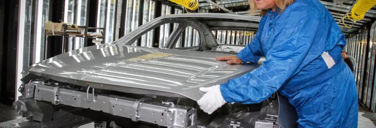 A worker on an automobile production line at the General Motors Fairfax Assembly Plant in Kansas City, Kansas.