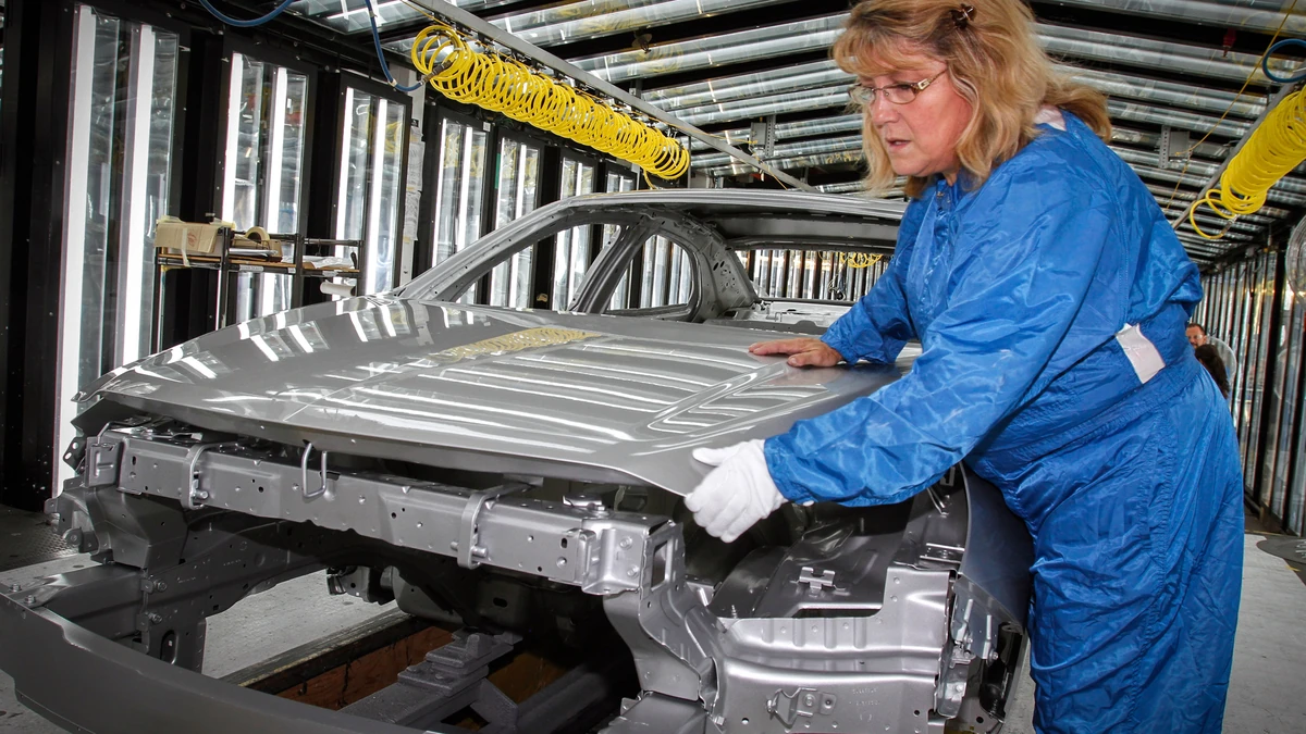 A worker on an automobile production line at the General Motors Fairfax Assembly Plant in Kansas City, Kansas.