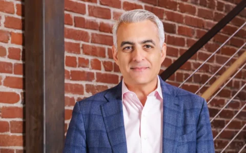 David Wadhwani in an official Adobe portrait.