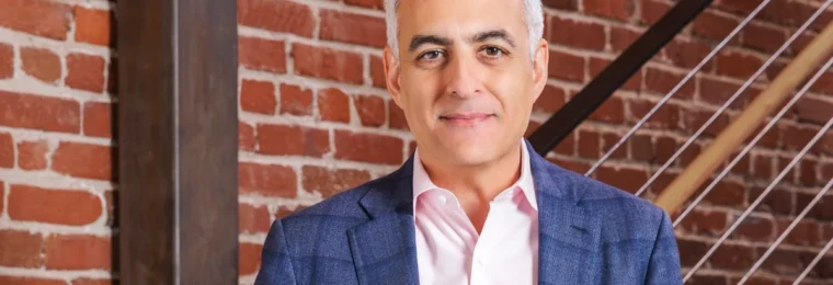 David Wadhwani in an official Adobe portrait.