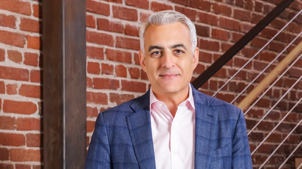 David Wadhwani in an official Adobe portrait.