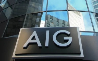 AIG sign on the company’s former headquarters building at 175 Water Street in New York City.