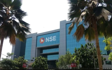 National Stock Exchange of India building in Mumbai with NSE signage.