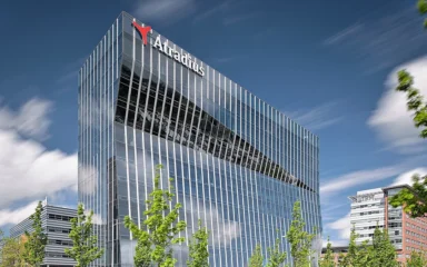 Atradius corporate headquarters building in Amsterdam with the Atradius sign visible near the roofline.