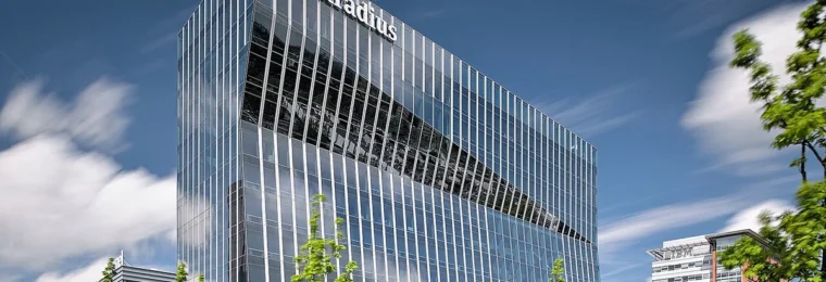 Atradius corporate headquarters building in Amsterdam with the Atradius sign visible near the roofline.